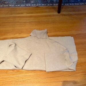 Turtleneck Sweater in Light Beige. One size. Oversized like a tunic